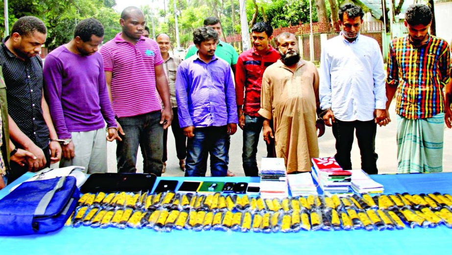 Eight alleged swindlers including 3 Nigerians were arrested from Mohammadpur and Baridhara areas alongwith 67 cheque books, 15 ATM cards, 16 mobile phones and laptop from their occupations on Saturday.