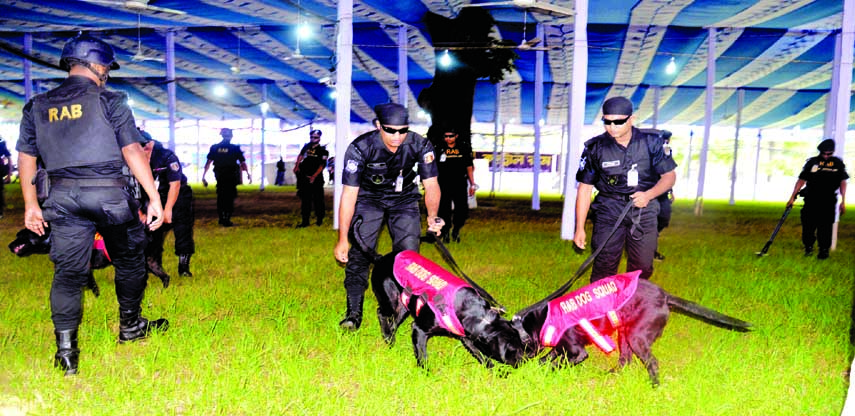 Law enforcers scanning the Jatiya Eidgah ground in the city on Sunday with dog squad ahead of holy Eid-ul-Azha.