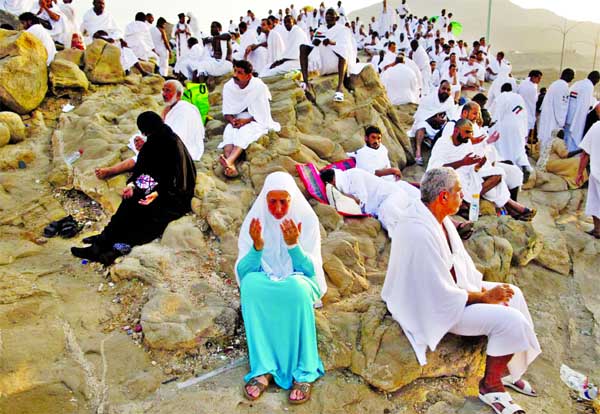 Muslim pilgrims join one of the Hajj rituals on Mount Arafat near Mecca early on Sunday.