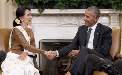 Aung San Suu Kyi of Myanmar shakes hands with US President Barack Obama during a bilateral meeting.