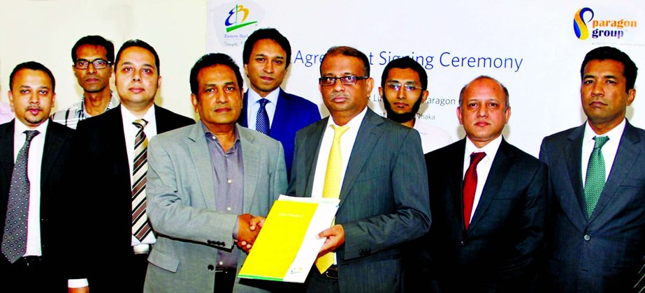 Ali Reza Iftekhar, Managing Director of Eastern Bank Limited (EBL) and Moshiur Rahman, Managing Director of Paragon Group exchanging a deal on cash management service in the city recently. EBL will ensure smooth payment service for Paragon through EBL Che