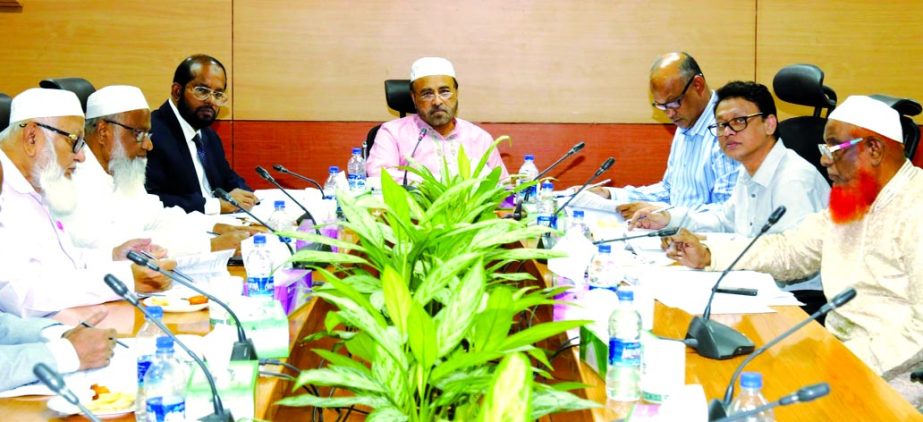 Hafez Md. Enayet Ullah, Chairman of the Board of Directors of Al-Arafah Islami Bank Limited, presiding over the 549th EC Meeting at its head office in the city recently. Members of the Committee Abdul Malek Mollah, Nazmul Ahsan Khaled, A N M Yeahea, Engr.