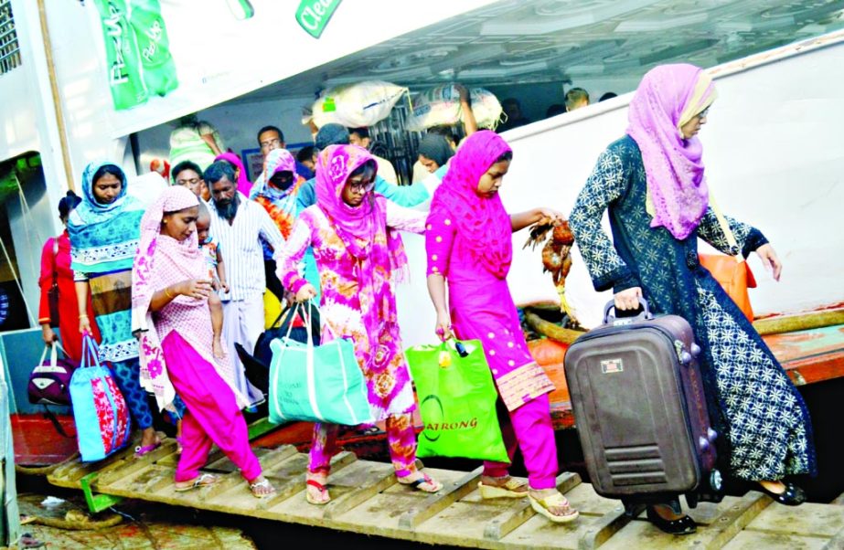 People continuing to return to capital after celebrating Eid-ul-Azha holiday with loved ones. This photo was taken from the Sadarghat Launch Terminal on Friday.