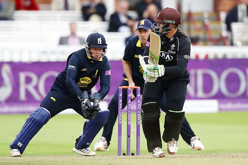 Tim Ambrose gathers the ball down the leg side seconds before stumping Steven Davies during the Royal London Cup Final between Surrey and Warwickshire at Lord's on Saturday.