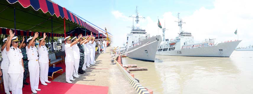 Area Commander of Chittagong Naval base Rear Admiral M Akhtar Habib, Assistant Naval Chief Rear Admiral M Shahin Iqbal and other senior naval officials waving hands before sailing the voyage of 2 BN frigates leave for India, Sri Lanka yesterday. ISPR p