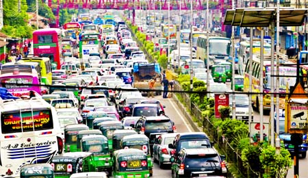 TRAFFIC GRIDLOCK: Thousands of vehicles stuck up as city returning to old face. This photo was taken from Banani area on Sunday.