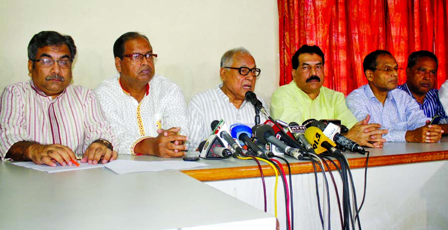 BNP Standing Committee member Nazrul Islam Khan speaking at a press conference at the party central office in the city's Nayapalton on Monday in protest against arrest and repression of BNP leaders and activists.