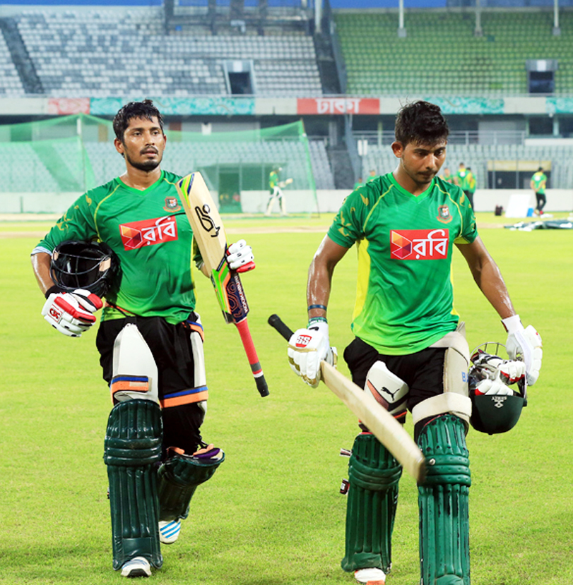 Anamul Haque and Mosaddek Hossain walk back from the nets at their practice session at the Sher-e-Bangla National Cricket Stadium in Mirpur on Sunday.