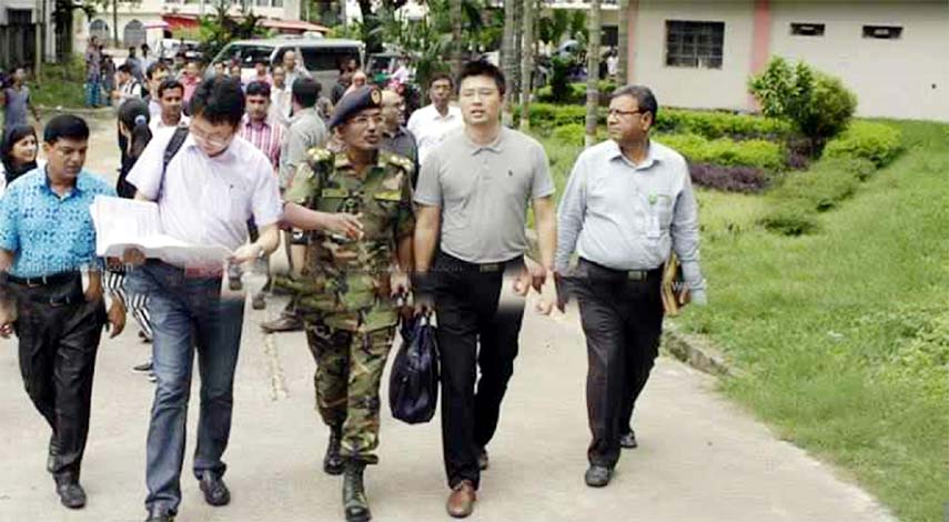 Chinese medical experts visiting site of the proposed modern Burn and Plastic Surgery Unit of Chittagong Medical College Hospital on Monday.
