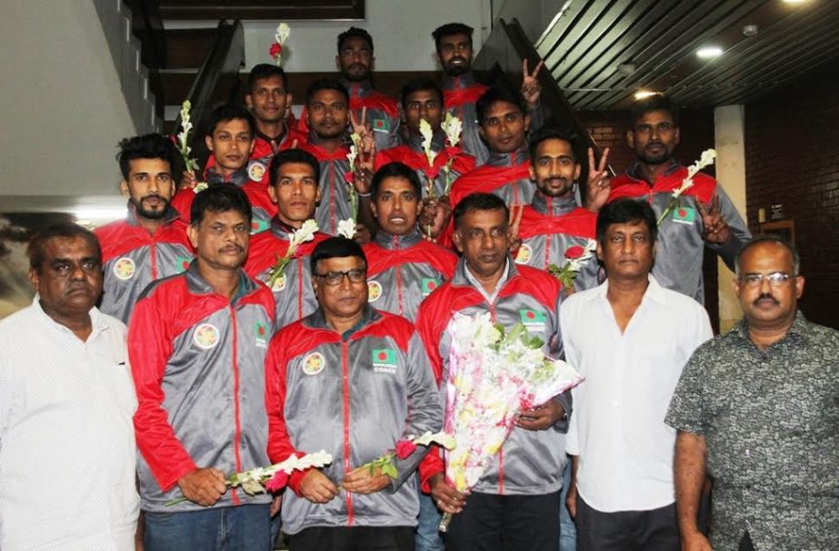 The officials of Bangladesh Volleyball Federation receive Bangladesh National Volleyball team with bouquet at the Hazrat Shahjalal International Airport on Monday. Bangladesh National Volleyball team became runners-up of the zonal phase of the qualifying