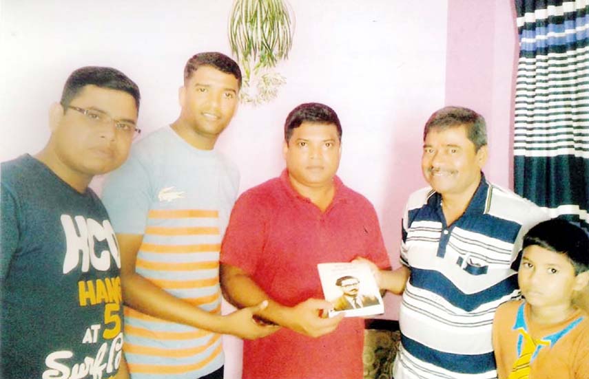 Md Abdur Rahim, General Secretary , Bangabandhu and Char Neta Smriti Parishad giving a copy of the book titled Bangabandhu's Incomplete Biography' to Mahbubur Rahman, Acting Mayor, Cox's Bazar at a ceremony recently.