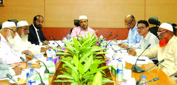 Hafez Md. Enayet Ullah, Chairman of the Board of Directors of Al-Arafah Islami Bank Limited, presiding over the 549th EC Meeting at its head office in the city recently. Members of the Committee Abdul Malek Mollah, Nazmul Ahsan Khaled, A N M Yeahea, Engr.