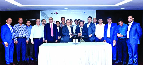 M. A. Sabur, Chairman of UCB and Nasir U. Mahmood, President of Uttara Club along with other guests at the agreement signing ceremony between United Commercial Bank Limited and Uttara Club Limited on Wednesday at the Corporate Office of the bank.