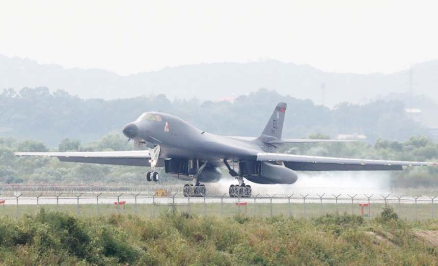 A US B-1B Lancer - aiming at reinforcing the US commitment to its key ally South Korea - makes a landing at the Osan Air Base in Pyeongtaek on Wednesday.