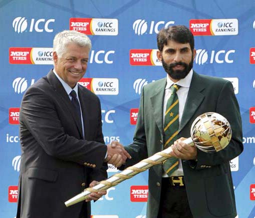 International Cricket Council (ICC) chief executive David Richardson (left) hands over the Test mace to Pakistan's skipper of Test cricket team Misbah-ul-Haq during a ceremony at Gaddafi Stadium in Lahore, Pakistan on Wednesday. Misbah-ul-Haq says it's