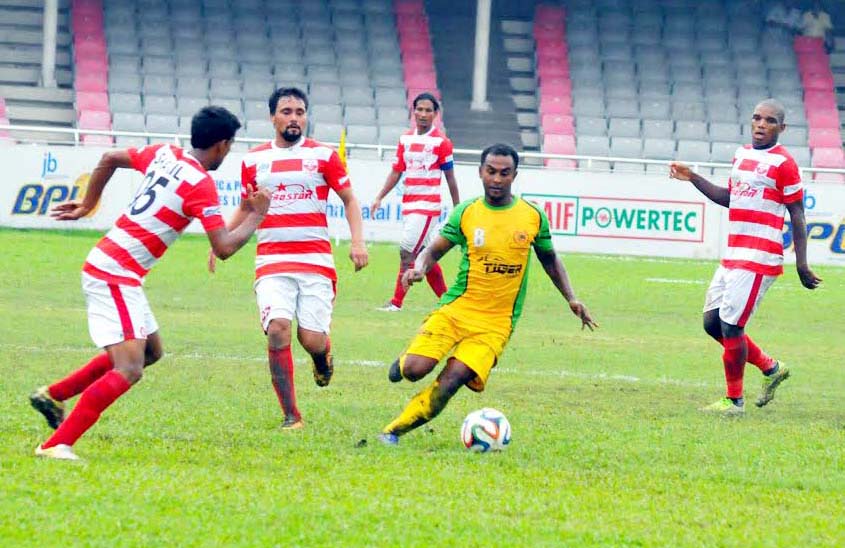 A moment of the match of the JB Group Bangladesh Premier League Football between Feni Soccer Club and Rahmatganj MFS at the Bangabandhu National Stadium on Wednesday.