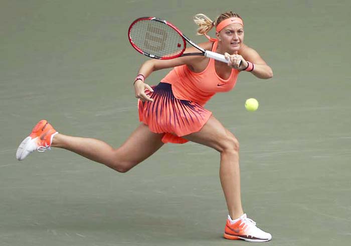 Petra Kvitova of the Czech Republic returns a shot against Monica Puig of Puerto Rico during the women's singles match at the Pan Pacific Open women's tennis tournament in Tokyo on Wednesday.