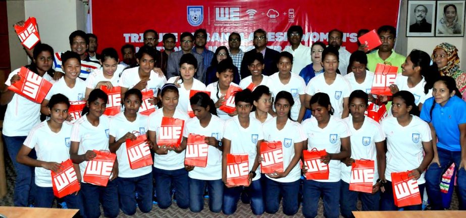 Members of Bangladesh National Women's Under-16 Football team and the officials of Aamra Network and the officials of Bangladesh Football Federation (BFF) pose for a photo session at the BFF House on Thursday.