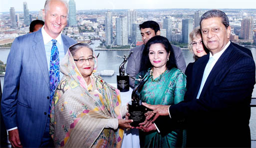 Prime Minister Shiekh Hasina received the Planet 50-50 Champion and Agent of Change Award for her contributions to women empowerment in New York on Wednesday. Photo-Agency