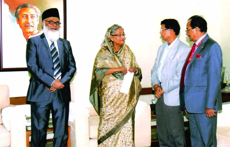 Golam Dastagir Gazi, MP, Director and Nur Mohammed, Chairman, Executive Committee member of Jamuna Bank Foundation handed over a cheque of Tk 50 lakh to the Prime Minister Sheikh Hasina for her Relief Fund at the Ganobhaban recently.