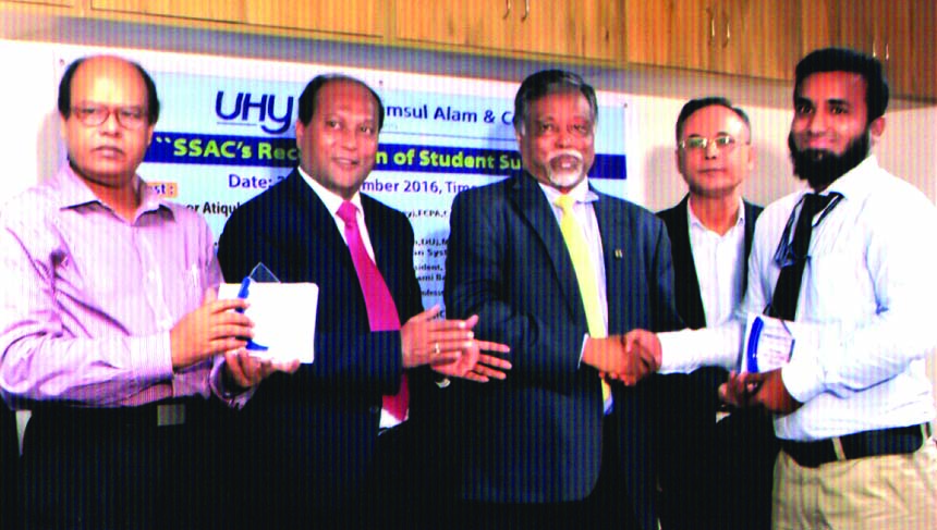 Professor Atiqul Islam, Vice Chancellor of North South University, distributing crest among the CA students in the city recently. Prof MA Hakim, Chairman, Accounting and Information System Dpt of Dhaka University and Md Humayun Kabir FCA, former President