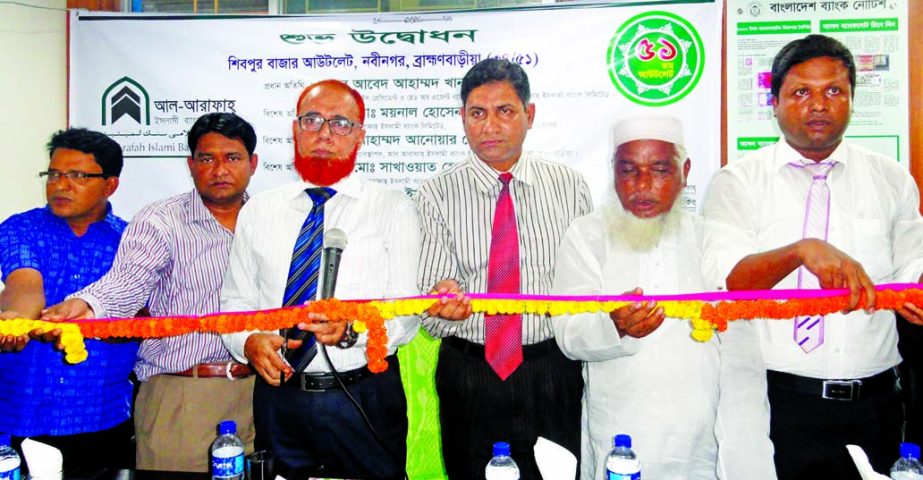 Abed Ahmed Khan, Head of Agent Banking Division of Al-Arafah Islami Bank Ltd, inaugurating its Agent Banking Outlet at Shibpur Bazaar branch in BBria recently. Md Moynal Hossain, Assistant Vice President and Md Anowar Hossain, Manager, Nabinagar Branch of