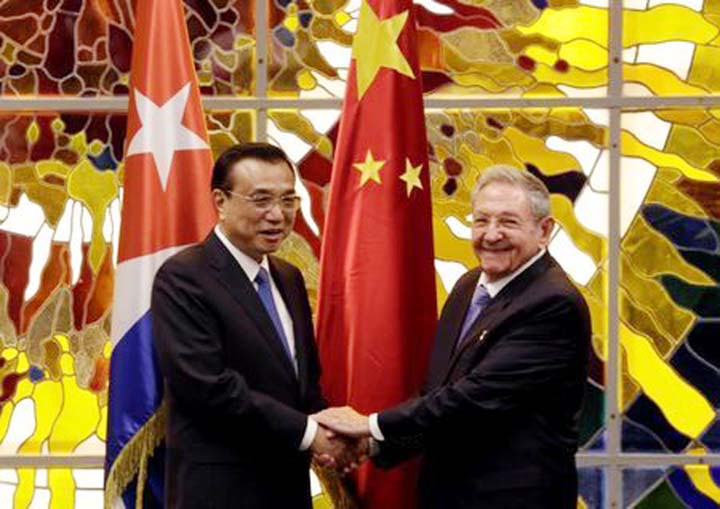 Cuba's President Raul Castro shaking hands with Chinese Premier Li Keqiang during their meeting at Havana's Revolution Palace, Cuba.