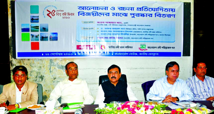 Shipping Minister Shajahan Khan, among others, at a discussion on the occasion of World River Day organised by different organisations at the Jatiya Press Club on Sunday.