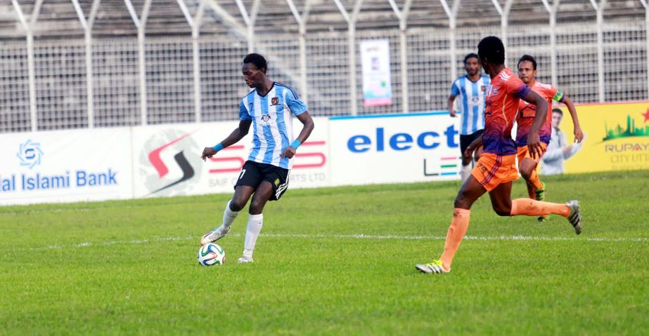 A moment of the match of the JB Group Bangladesh Premier League Football between Sheikh Jamal Dhanmondi Club Limited and Brothers Union at the Sylhet District Stadium on Sunday.