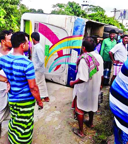 One person was killed and 25 others injured when a passenger bus turned turtle at Sirajdikhan area in Munshiganj due to reckless driving on Sunday.