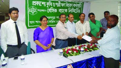 SAIDPUR (Nilphamari): BASIC Bank, Saidpur Branch distributing rural and agriculture loan among the farmers and poor people on Sunday. Deputy General Manager of Bangladesh Bank, Rangpur Zone Jayanta Kumar Bonik was present as Chief Guest of the prog