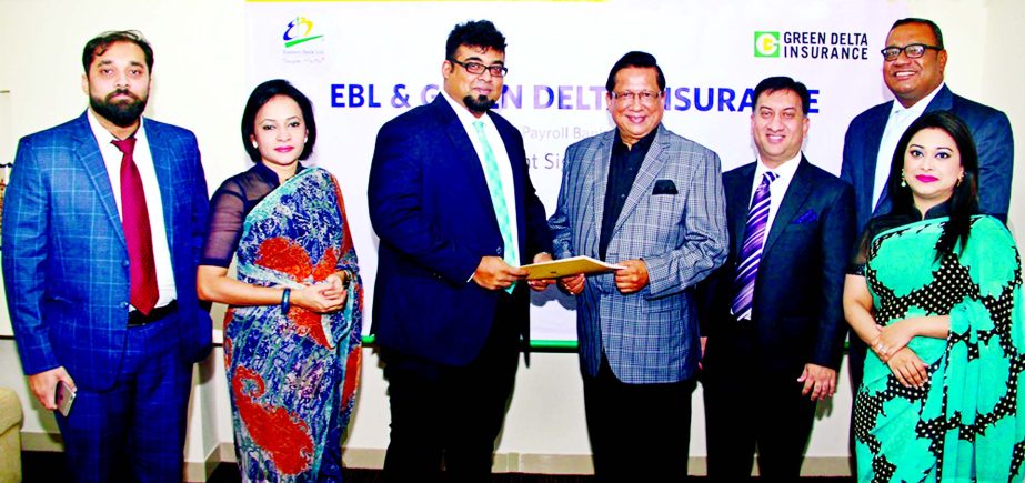 Nazeem A Choudhury, Head of Consumer Banking of Eastern Bank Ltd and Nazim Tazik Chowdhury, Additional Managing Director of Green Delta Insurance Ltd exchanging Payroll Banking Agreement in the city recently. High officials of both organizations were pres