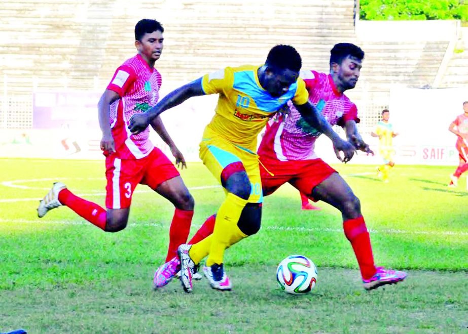 An action from the match of the JB Group Bangladesh Premier League Football between Chittagong Abahani Limited and Feni Soocer Club at the Sylhet District Stadium in Sylhet on Tuesday.