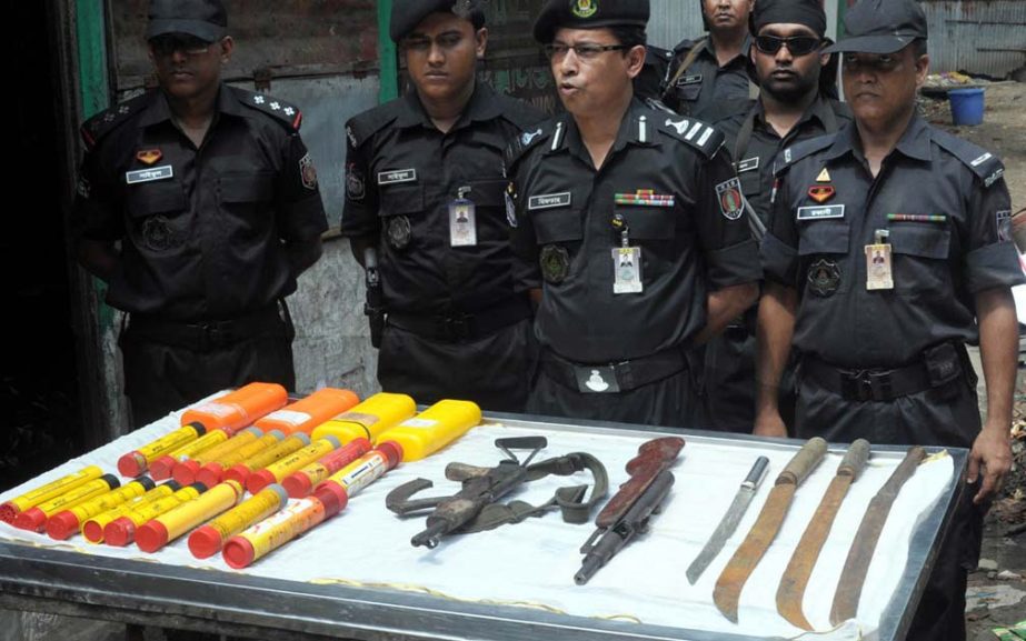 Members of Rapid Action Battalion (RAB) recovered two firearms, two magazines and four sharp weapons from the Bastuhara Colony in Ice Factory Road in Chittagong on Tuesday morning.