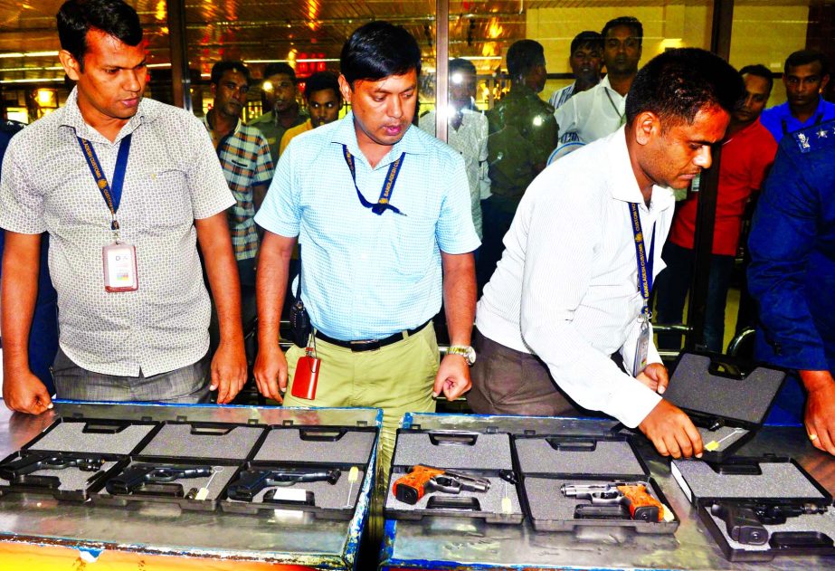 Customs Official recovered nine pistols from two Bangladesh-origin German citizens at Hazrat Shahjalal International Airport (HSIA) on Tuesday.