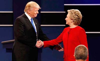 Hillary Clinton and Donald Trump greet each other ahead of the 1st part of the US Presidential debate.