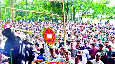 MASS TRIBUTE: Thousands of people of all walks of life turned up at the Central Shaheed Minar to pay their last respects to literary genius Syed Shamsul Haq on Wednesday.