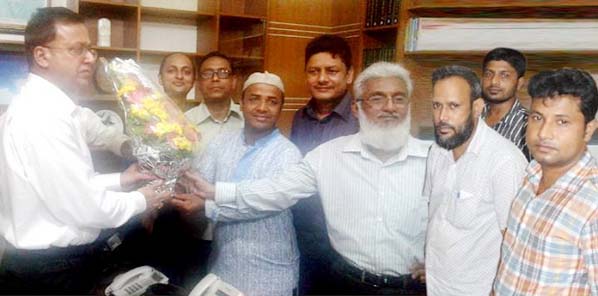 On behalf of the Azizur Rahaman Homeopathic Medical College, Ex-Students Parishad and officials of the Parishad greeting the newly joined Deputy Commissioner, Chittagong Md. Shamsul Arefin by presenting bouquet yesterday.
