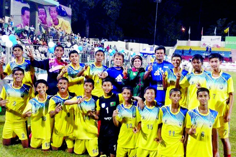 Members of BKSP Under-14 Football team pose for photo at Ambedkar Stadium in Delhi on Thursday. BKSP became unbeaten champion in U-14 Football Subroto Cup 2016 Tournament beating Chondigoar Under-14 Football team 4-2 in tie-breaker.