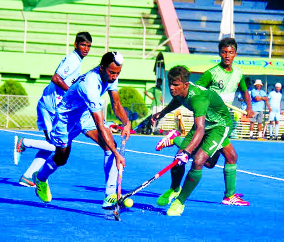 A scene from the final match of the Under-18 Asia Cup Hockey between Bangladesh Under-18 Hockey team and India Under-18 Hockey team at the Maulana Bhashani National Hockey Stadium on Friday.