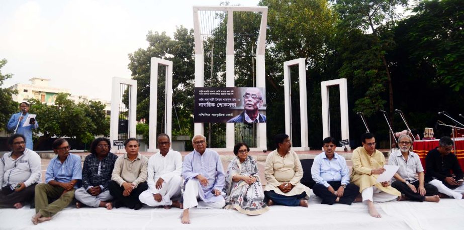 Distinguished persons at a condolence meeting in memory of versatile writer Poet Syed Shamsul Haque organised by Sammilita Sangskritik Jote at the Central Shaheed Minar in the city on Saturday.