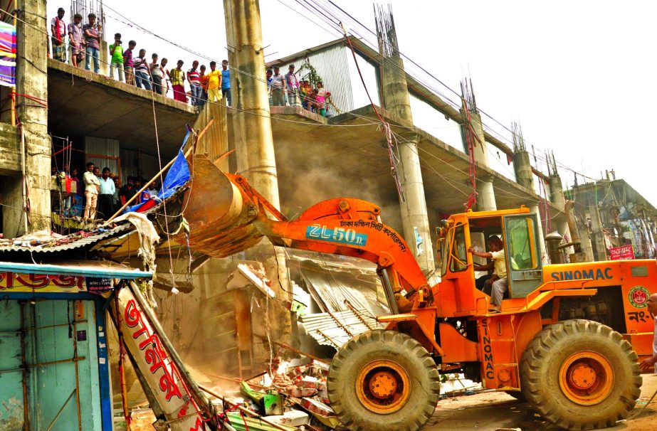 Dhaka South City Corporation (DSCC) evicted illegal structures at Fulbaria in Gulistan area on Monday.