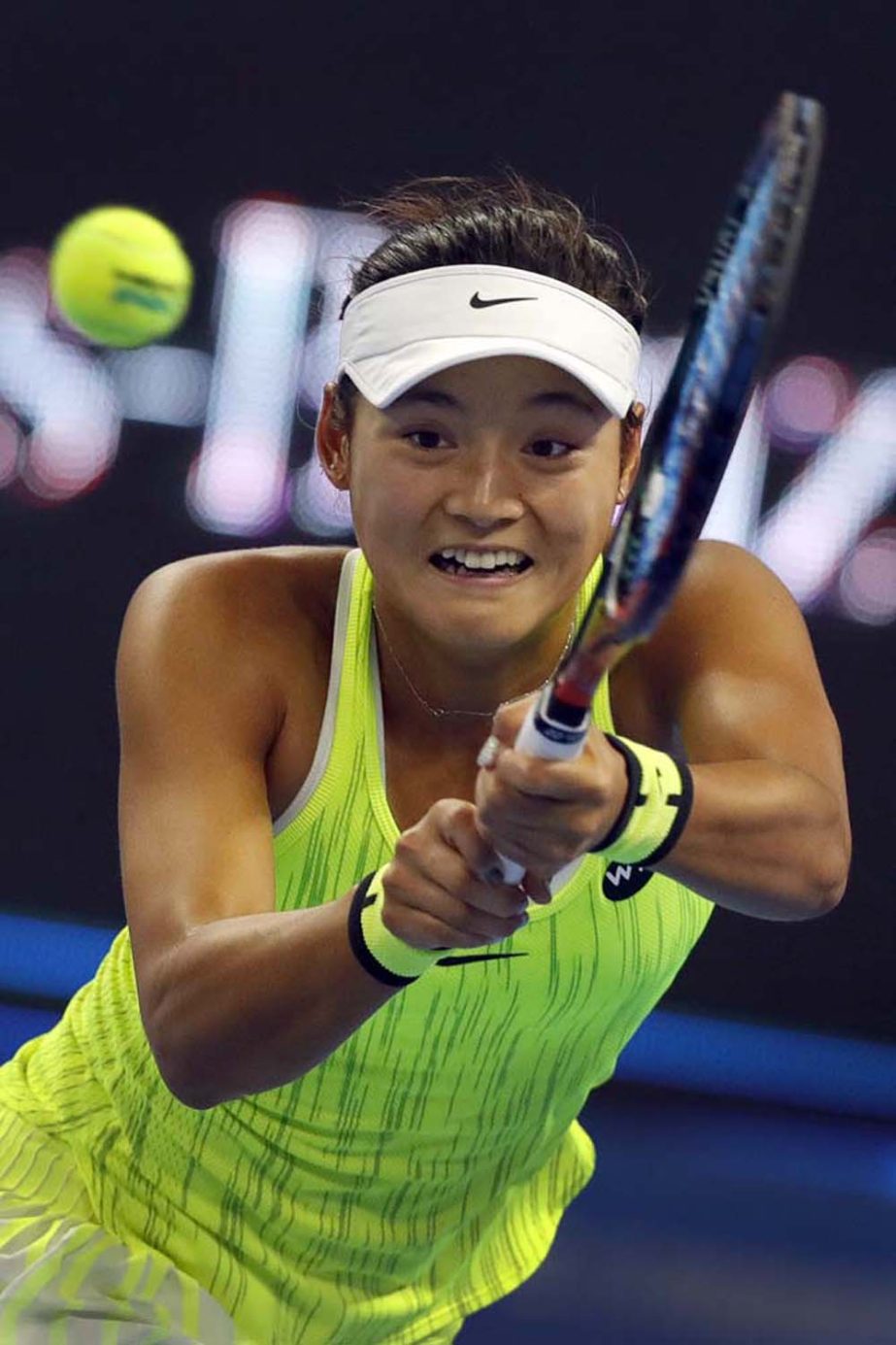 Wang Yafan of China hits a return shot against Petra Kvitova of the Czech Republic during their women's singles match at the China Open tennis tournament at the Diamond Court in Beijing on Tuesday.