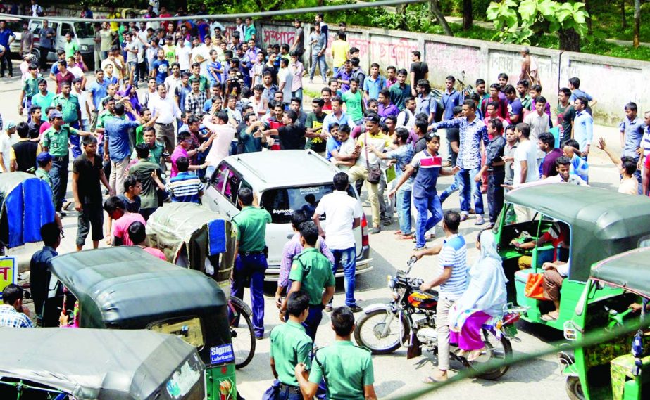 Students of Sylhet MC College put barricade on Sylhet-Tamabeel Highway on Tuesday protesting attack on fellow student Khadija Akhter and early punishment of culprit BCL activist.