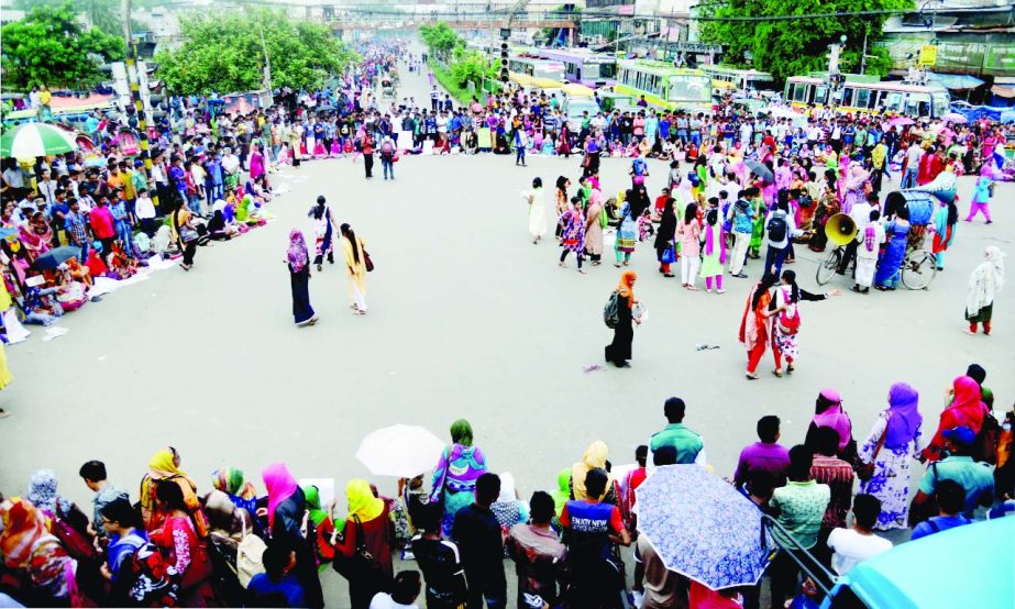 Students of Home Economics College on Tuesday blocked Nilkhet intersection in the city demanding turning the college into an institute under the Dhaka University.