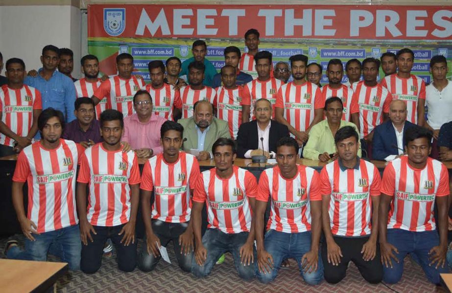Players of SAIF Sporting Club pose for a photo session after completing their players' registration programme for the upcoming Bangladesh Championship League, at the BFF House on Wednesday.