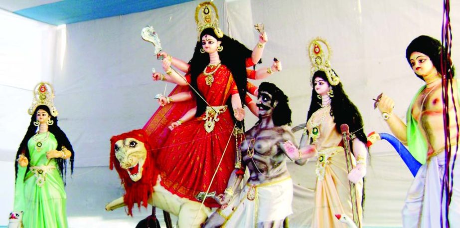 RANGPUR: Finishing touches being given to idols of Goddess Durga to make those more charming as preparation completed to celebrate Durga Puja by people of Hindu community from Friday.