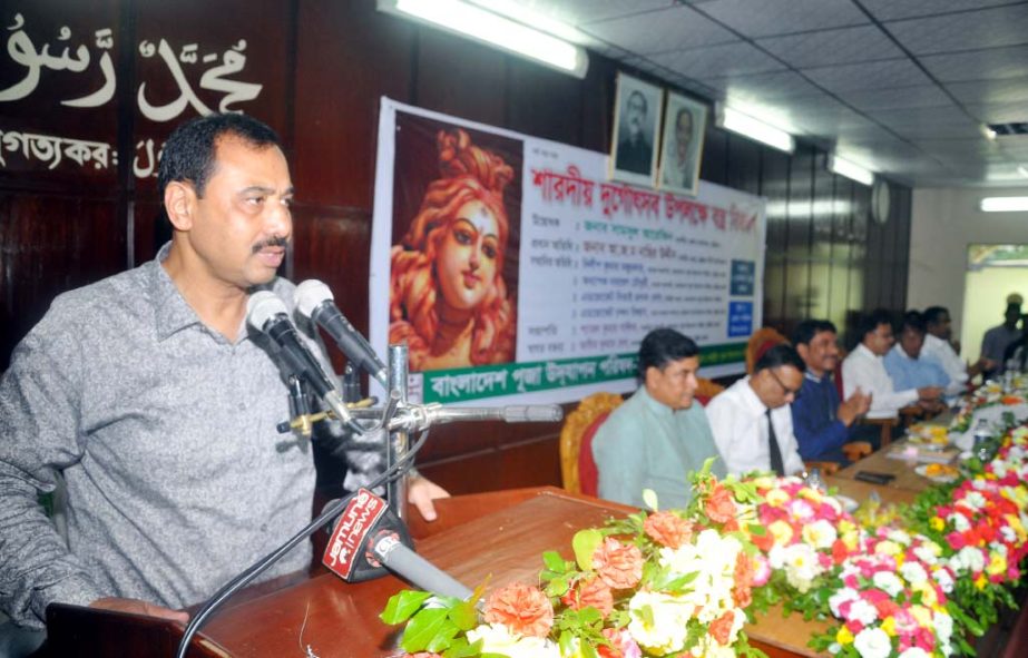 CCC Mayor A J M Nasir Uddin speaking at a cloth distribution programme ahead of Durga Puja in Chittagong organized by Chittagong Puja Udjapon Committee as Chief Guest on Wednesday.