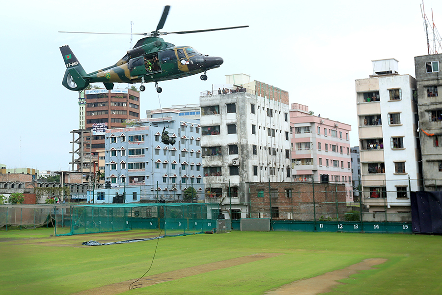A helicopter hovers over the Academy ground near the Sher-e-Bangla National Cricket Stadium on Thursday on the eve of the first ODI between Bangladesh and England.