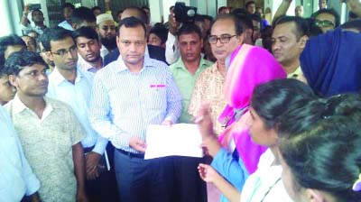 SYLHET: Sylhet Govt. Womenâ€™s College students handing over a memorandum yesterday addressing Prime Minister Sheikh Hasina through Zainul Abedin, Deputy Commissioner, Sylhet realising 4-point demand including capital punishment to Badrul who attacke